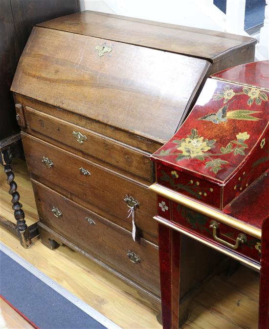 A George III oak bureau W.84cm